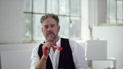 Artist pauses his work to think about it Stock Footage