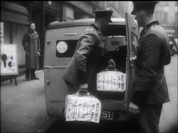 MOTORISTS' PETITION IMPRESSES COMMONS News Clip