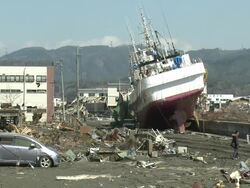 Damage in port area of Kesennuma City, Japan filmed on 1 April 2011, 3 weeks after a tsunami which was caused by magnitude 9 Tohoku earthquake off north east Japan / AUDIO Stock Footage