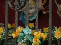 CU TU Flowers in Shrine of Virgin Mary and Baby Jesus / Venice, Italy Stock Footage
