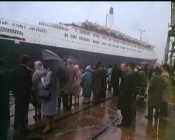 From Southampton, the greatest passenger-ship in the world begins the most important voyage since her launching - the Maiden voyage to New York. 65,000 Tons of marine sophistication prepares to vindi News Clip