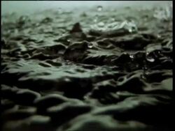 High Speed Water Drops on Water, tracking Stock Footage