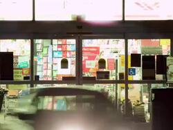 MS T/L Sliding doors at supermarket grocery store at night / Los Angeles, California, United States  Stock Footage