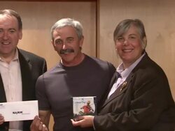 Executive Director W.O.Smith Music School, Jonah Rabinowitz, President GAC, Ed Hardy, Mike Huckabee, Aaron Tippin, and NAMM Executive Director Mary Luehrsen Stock Footage