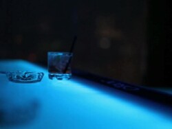 Bar counter. Customer paying cash money to bartender.  Drinks, alcohol. Stock Footage