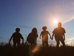 Family celebrate joy at sunset Stock Footage