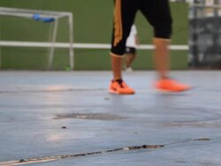 play soccer in evening Stock Footage