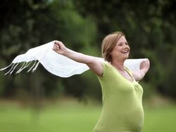 HD Super Slow-Mo: Pregnant Woman Holding Scarf In Wind Stock Footage