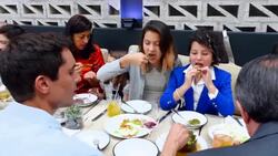 MS PAN Multigenerational family eating together during party at table in restaurant Stock Footage