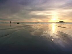WS POV ZI SLO MO Woman running on beach / Bandon, OR, United States  Stock Footage