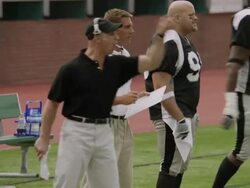 MS, PAN, American football coach yelling at players from sidelines, Staten Island, New York, USA Stock Footage