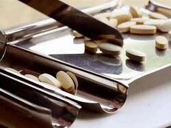 Counting tablets medicine Stock Footage