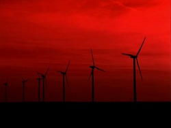 wind turbines against red sunset Stock Footage