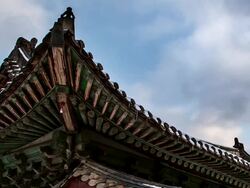 CU T/L Shot of Snow covered tiled roof in Changgyeonggung Royal Palace / Seoul, South Korea  Stock Footage