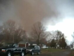 MS POV ZI Shot of tornado tracks off to northeast with destroying house at end of street / Woodward, Iowa, United States Stock Footage