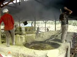 MS Men working on the boilers of the sulfur mining / Ijen, Java, Indonesia Stock Footage