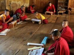 Young monks studying for there education, Chimi Lhakhang monastery, Pana, Bhutan, Asia Stock Footage