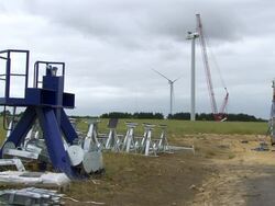 MS TU Shot of Wind turbine fixtures on ground and wind turbine / Macarthur, Victoria, Australia Stock Footage