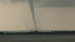 A beautiful but dangerous tornado seen near Arnett, Oklahoma. This tornado occurred on the same day a deadly tornado struck Greensburg, Kansas. Stock Footage