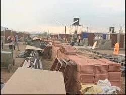 Frmr US President Carter visits construction site of 100 houses for poor News Clip