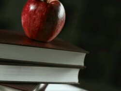 HD: Red Apple On Books Stock Footage