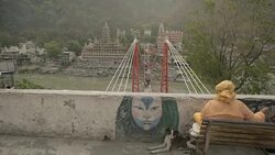W/S CRANE IN suspension bridge over Ganges river, Rishikesh, India Stock Footage