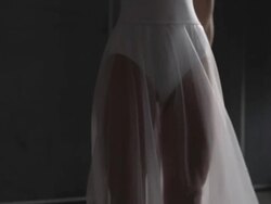 Three ballerinas performing arabesque Stock Footage