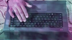 Human Fingers Typing on the Laptop Keyboard Stock Footage