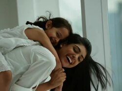 Woman playing with her daughter  Stock Footage