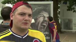 WC visitors take selfies with advert showing Suarez baring his teeth News Clip