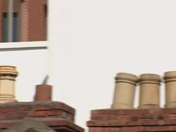 MS PAN TD Shot of sculpture with painting on wall / Dublin, Ireland Stock Footage