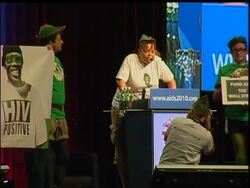 Protestors disrupted billionaire Bill Gates as he spoke to the International AIDS Conference. They asked him to support a "Robin Hood Tax" to fund global health initiatives. News Clip