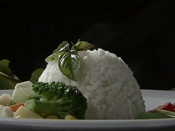 Rice with vegetable on plate Stock Footage