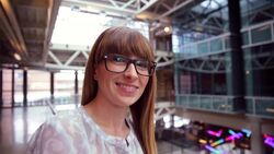 Close up portrait of smiling businesswoman wearing eyeglasses Stock Footage