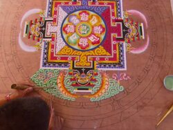 MS ZI Man sprinkling green sand mandala / Kathmandu, Central Region,Nepal Stock Footage