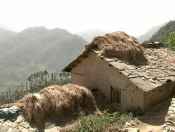 House next to Himalaya mountains Stock Footage