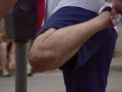 HD 1080i Man Stretching for a Run 2 Stock Footage