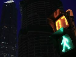 Woman scenting yellow flowers in the park Stock Footage