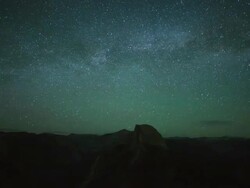 WS T/L View of half dome with milky way at night / Yosemite, California, United States Stock Footage