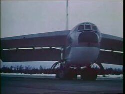 1960s B-52 bomber turning on runway / Cold War / documentary Stock Footage