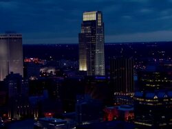 Downtown Omaha night cityscape featuring First National Tower and Woodmen Tower Stock Footage