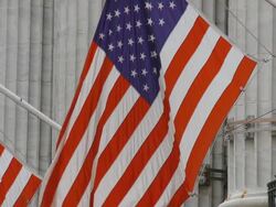 CU American Flag blowing in the wind at the New York Stock Exchange / New York City, New York State, USA  Stock Footage