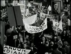 Delegates hold banners and posters of Alf M. Landon at the 1936 Republican National Convention in Cleveland, Ohio. News Clip