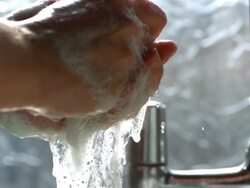 CU hands washing under tap, UK Stock Footage