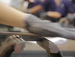 Close up of workers filling metal Stock Footage