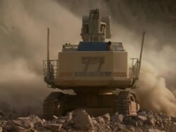 CU PAN Shot of excavator working on construction site / Namibia Stock Footage