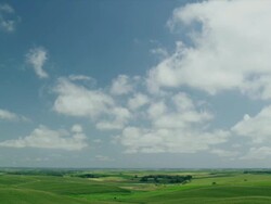 Beautiful sky scape and green farm fields Stock Footage