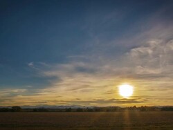 Sunset over meadow Stock Footage