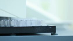 96 well plates on the Plate washer in laboratory Stock Footage