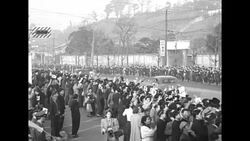 Douglas MacArthur's motorcade moves through Tokyo streets as he leaves Japan in 1951 News Clip